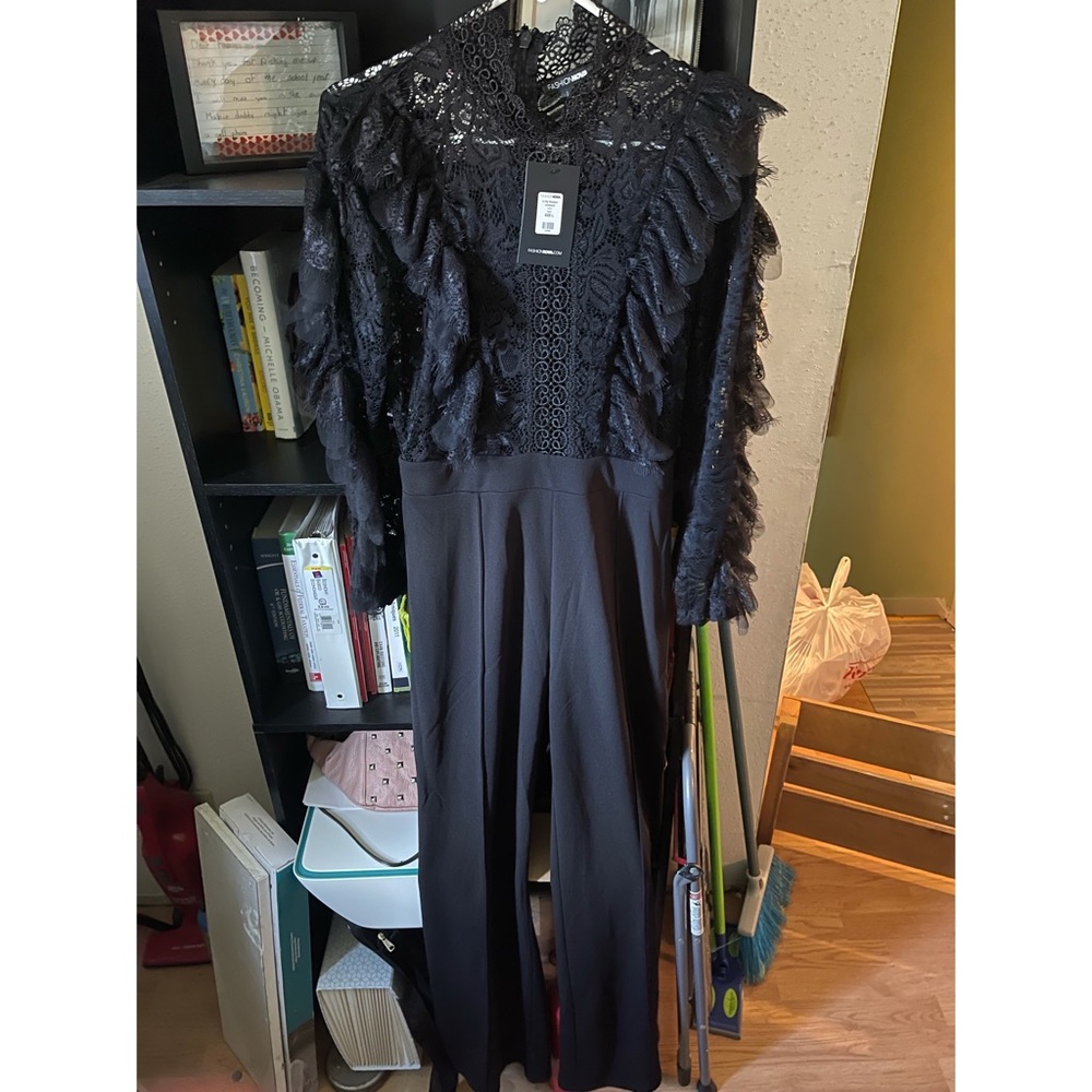 Black lace Fashion Nova Jumpsuit. Never been worn, new with tags. Size large